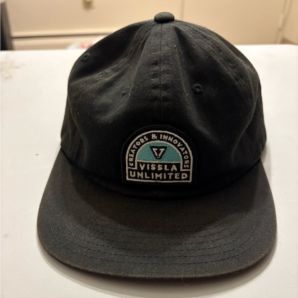 Flat brim hat. Buckle back.